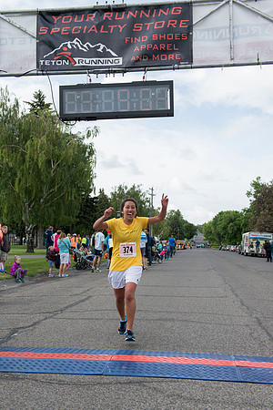 Teton Dam Marathon participants run towards the finish line at Smith Park in Rexburg, Idaho.