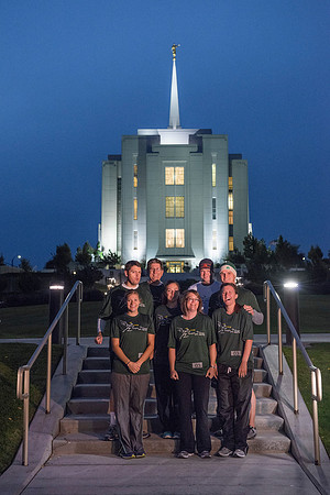 Team members pose by the Rexburg temple before they begin the temple to temple run
