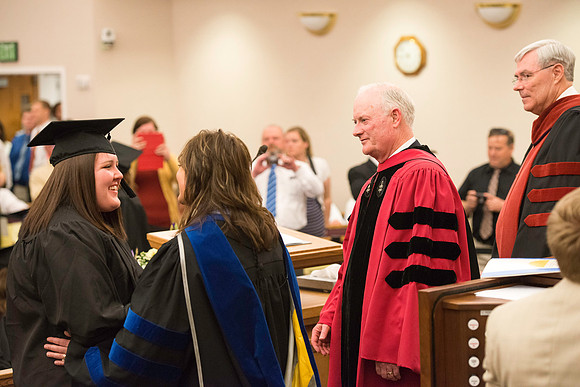 Convocation for the College of Education and Human Development was held in the Stake Center next to the Temple. Elder Kim B. Clark, Commissioner of Church Education gave some remarks and congratulated