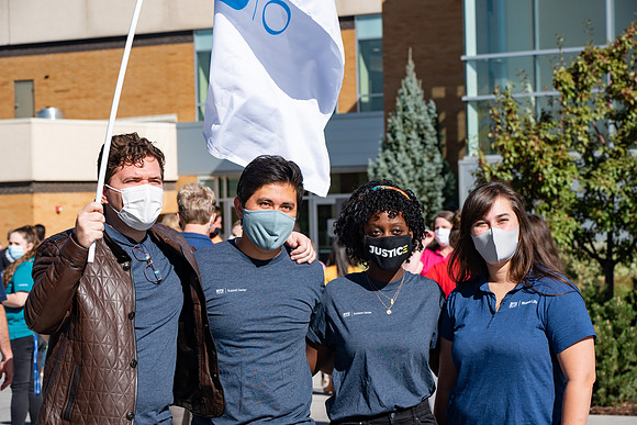 Video production of Vice President, Amy LaBaugh. Examples of students and faculty staying safe and healthy during the COVID-19 pandemic by social distancing, following pathway arrows, and wearing face