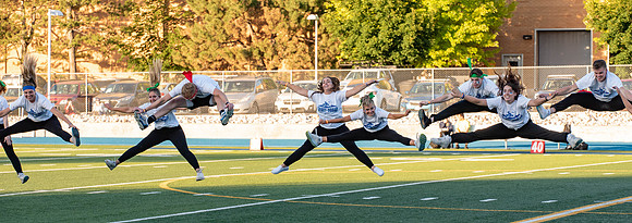 BYU-Idaho Football Teams compete in the Final Game of the Season. Students cheer them on from the stands, as the spirit team and Rix Stix Rally them up.