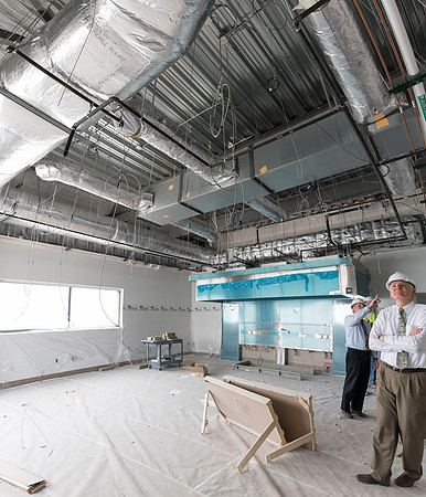 Faculty Members tour the new science building while it is still under construction.