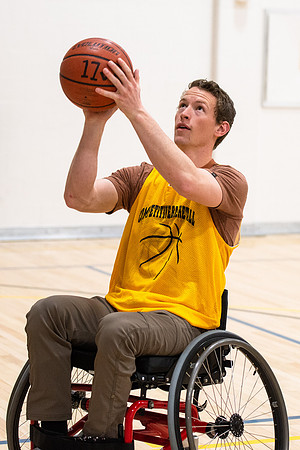 Students participate of Wheelchair Basketball in the Hart Gym.