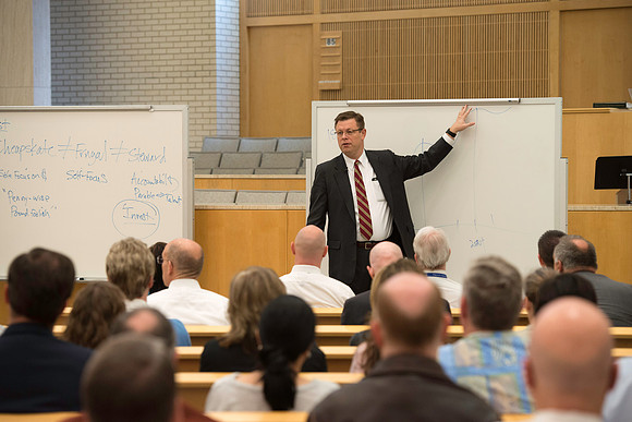 President Gilbert meets with employees in the Taylor Chapel.