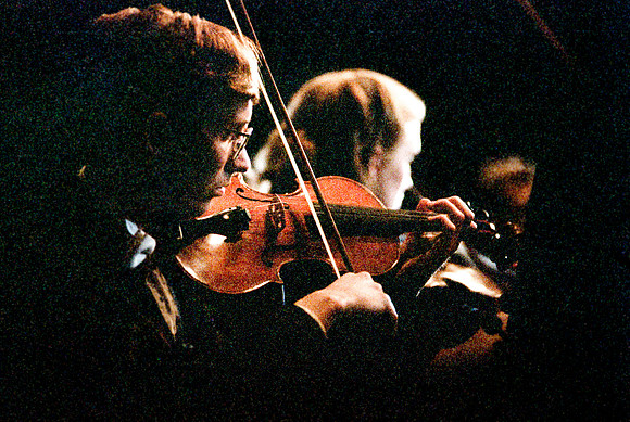 Orchestra member performing Imanuel in the Tabernacle