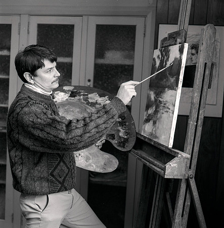 Nolan Pearson stands next to his work.