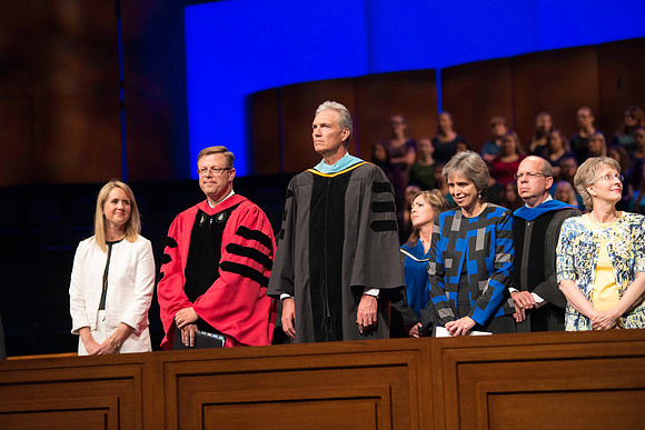 President and Sister Gilbert, Elder and Sister Devin Durrant