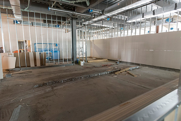 Faculty Members tour the new science building while it is still under construction.