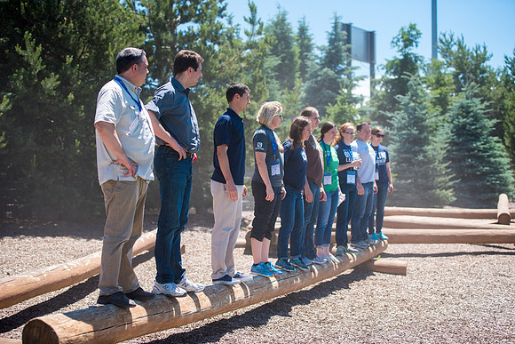 Online Instructors come to BYU-Idaho campus for further learning to enhance teaching skills. Instructors take their turn at the Ropes Course.