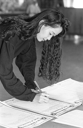 Students sign to commit to stay Drug-free. April 1990.