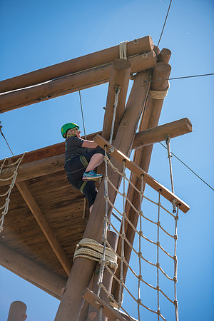 Online Instructors come to BYU-Idaho campus for further learning to enhance teaching skills. Instructors take their turn at the Ropes Course.