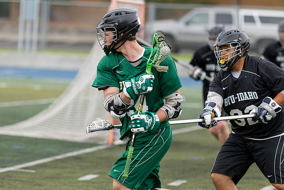Spartan's Kevin Bosley swim dodges past a Knight defender.