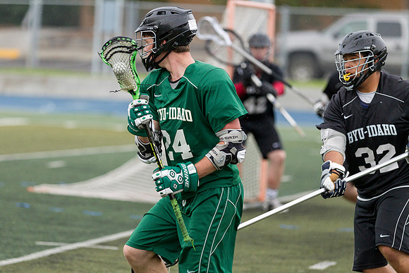 Spartan's Kevin Bosley swim dodges past a Knight defender.