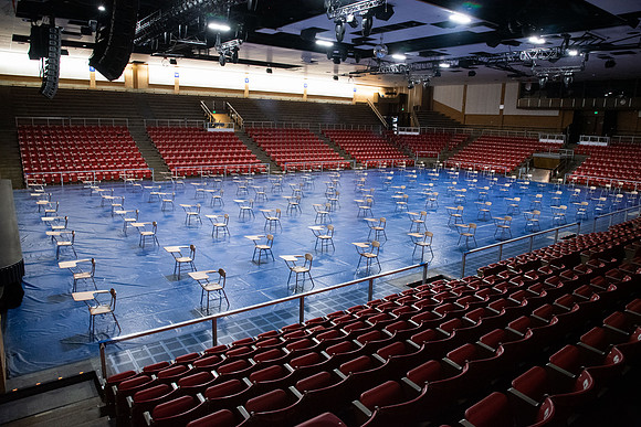Desks in the Hart gymnasium set 6ft apart to practice physical distancing in efforts to fight the COVID-19 virus.