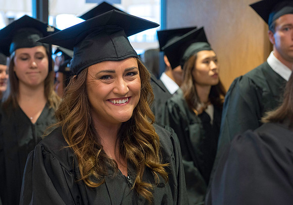 Graduates gather for the processional before BYU-Idaho commencement.