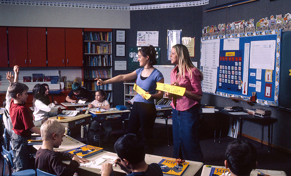 Student teachers practice in the classroom. March 6, 2002.