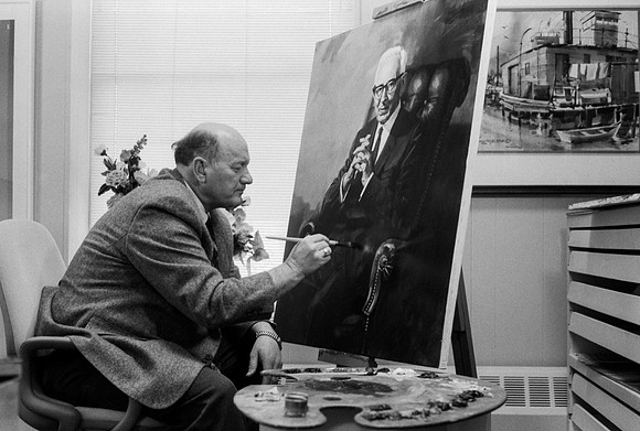 Dick Bird restoring painting of President Joseph Fielding Smith.