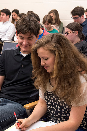 Students working with each other in the Foundations of the Restoration course on campus.