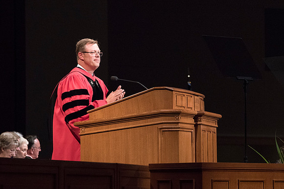 President Clark G. Gilbert addressing Brigham Young University-Idaho Graduates at Convocation. Photo by Ryan Chase.