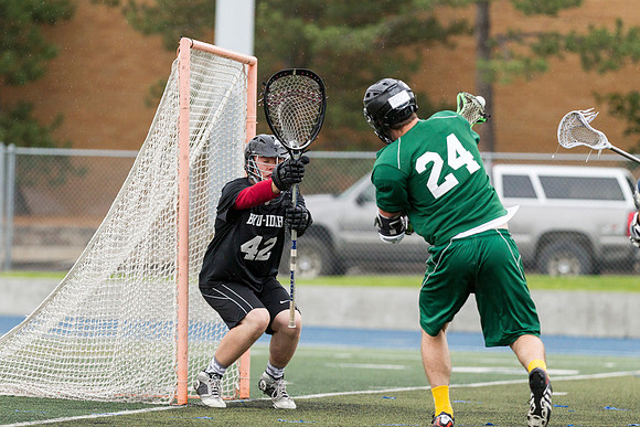 Spartan's Kevin Bosley takes a shot on goal against the Knights.