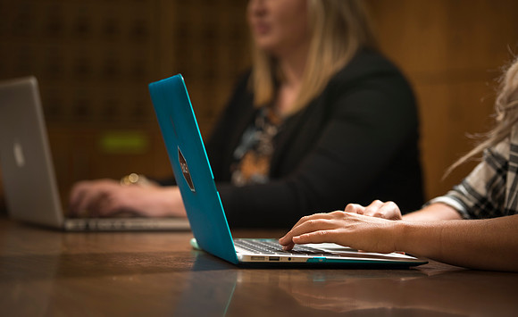 Katelyn Crompton and Rachael Redford study in the basement of the Smith Building.
