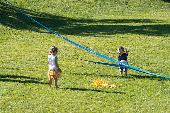 Faculty and their families, as part of the Online Learning & Teaching Conference, join together for dinner and games.