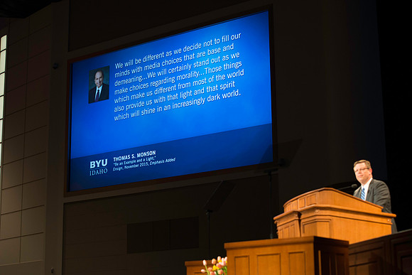 President Gilbert addresses the students the first devotional of the semester.