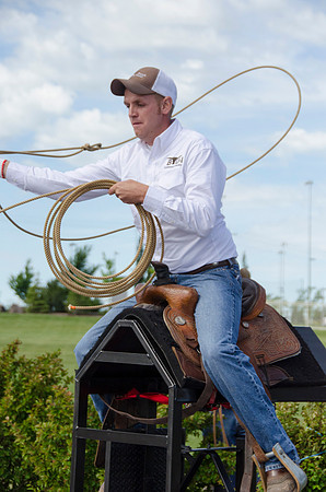 Student roping a "calf" from the saddle at BYU-Idaho's first Ag Days,