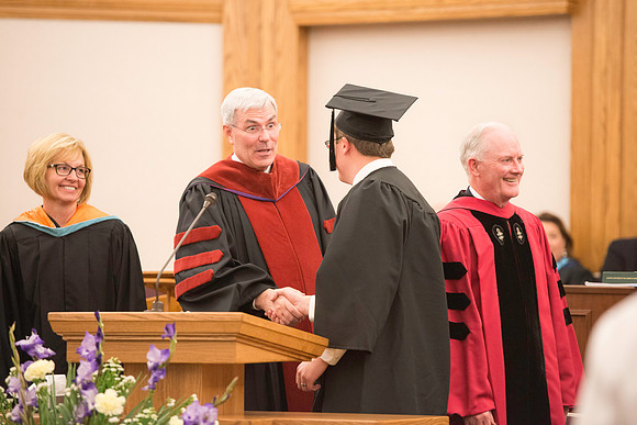 Convocation for the College of Education and Human Development was held in the Stake Center next to the Temple. Elder Kim B. Clark, Commissioner of Church Education gave some remarks and congratulated