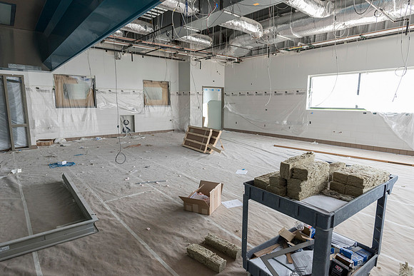 Faculty Members tour the new science building while it is still under construction.