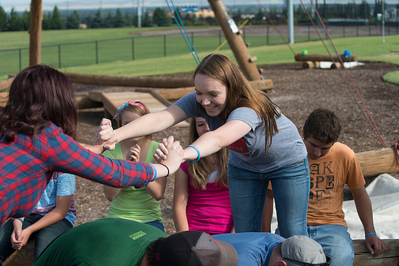 Youth high enjoy the Ropes Course class.