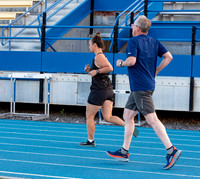 Faculty and community members of BYUI at Speed and Agility triathlete trannings at the stadium.