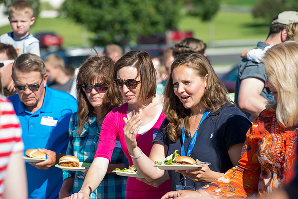 Faculty and their families, as part of the Online Learning & Teaching Conference, join together for dinner and games.