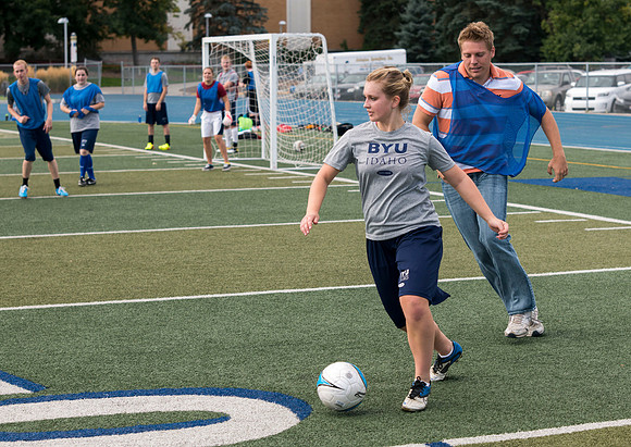 Students show off thier skills in a soccer class the first day of school.