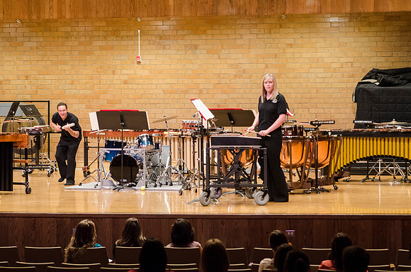 Students playing percussions at the RixStix concert, Students teasing each other during the piece, Spring 2013