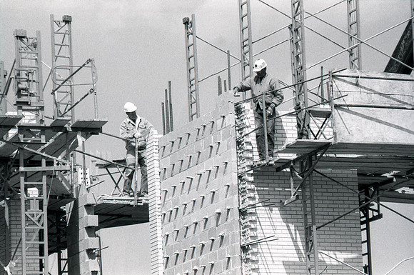 Construction takes place on the Religion Building site.