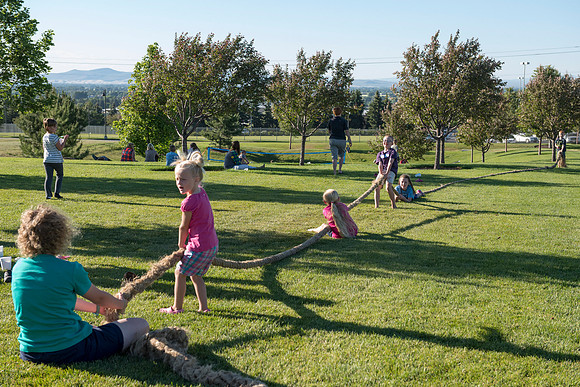 Faculty and their families, as part of the Online Learning & Teaching Conference, join together for dinner and games.
