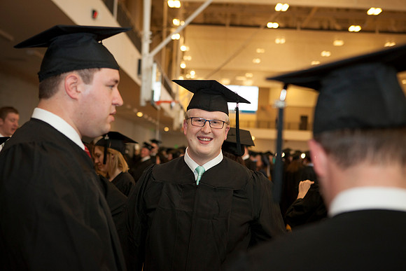 Students gather outside the I-Center before Commencement begins. Photo by Tyler Rickenbach.