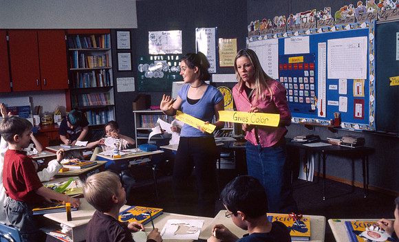 Student teachers practice in the classroom. March 6, 2002.