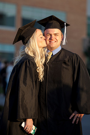Of those who graduated, 1,121 students were married and 864 were single. Sixty-six married couples graduated together.