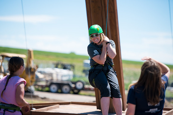 Online Instructors come to BYU-Idaho campus for further learning to enhance teaching skills. Instructors take their turn at the Ropes Course.