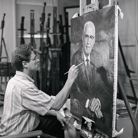 Leon Parson, artist, paints President Ezra Taft Benson.