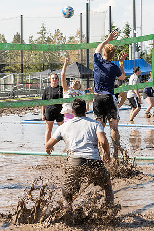 Students gather by the upper fields on the BYU-Idaho Campus to play recreation games, slip 'n' slide, mud volleyball, and try the ropes course.