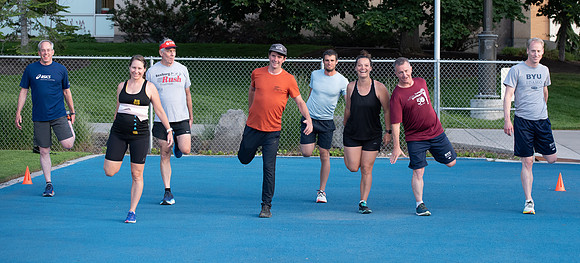 Faculty and community members of BYUI at Speed and Agility triathlete trannings at the stadium.