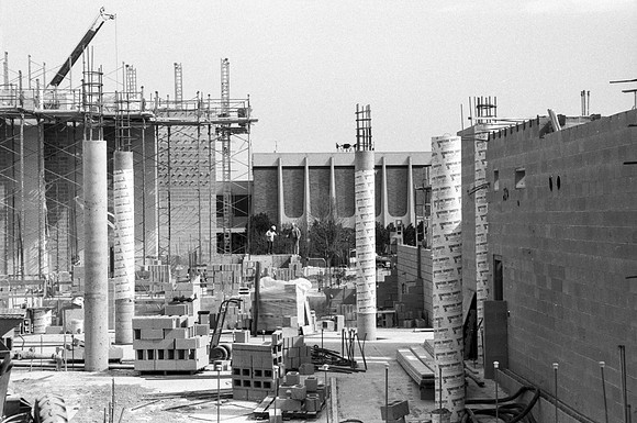 Construction takes place on the Religion Building site.