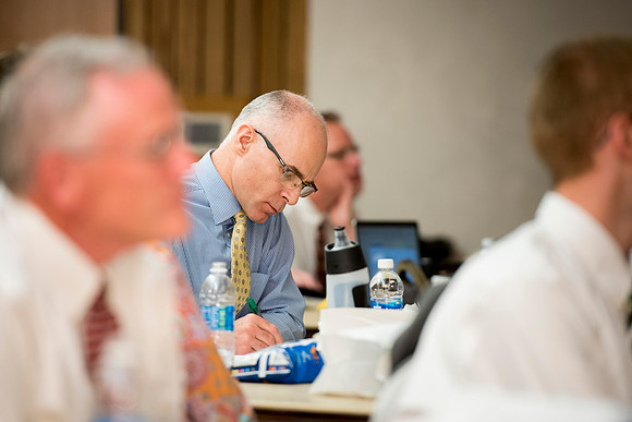 Joel Judkins from the Communications Department, takes notes during a discussion lead by faculty members about different techniques and teaching styles: gamification
