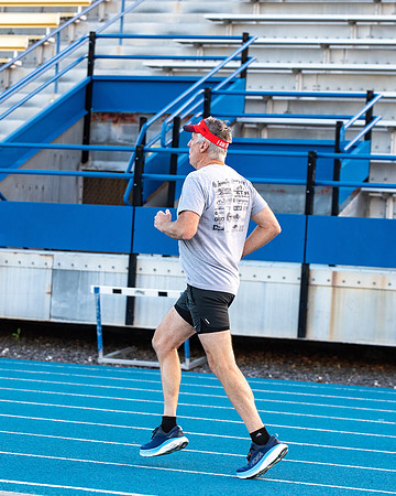 Faculty and community members of BYUI at Speed and Agility triathlete trannings at the stadium.