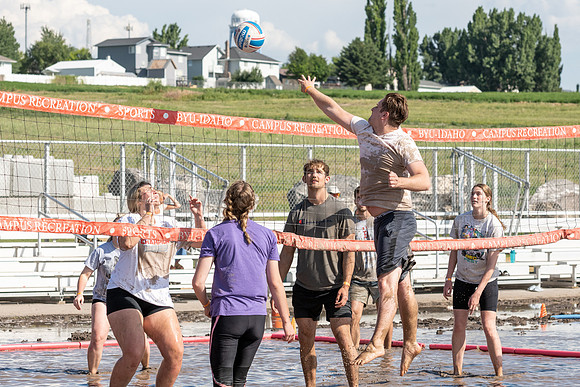 Students gather by the upper fields on the BYU-Idaho Campus to play recreation games, slip 'n' slide, mud volleyball, and try the ropes course.