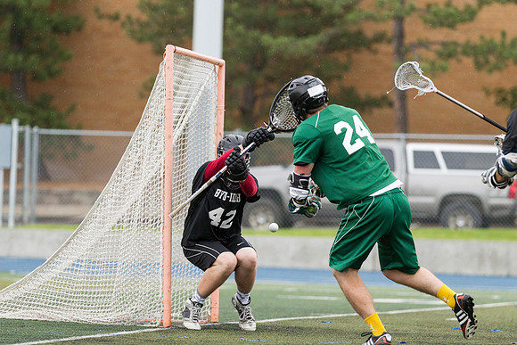 Spartan's Kevin Bosley takes a shot on goal against the Knights.