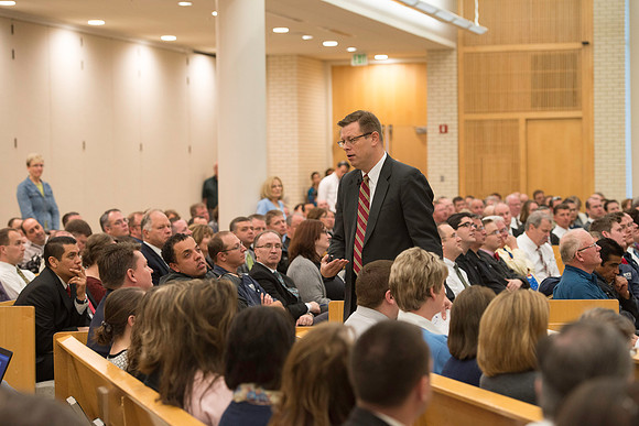 President Gilbert meets with employees in the Taylor Chapel.